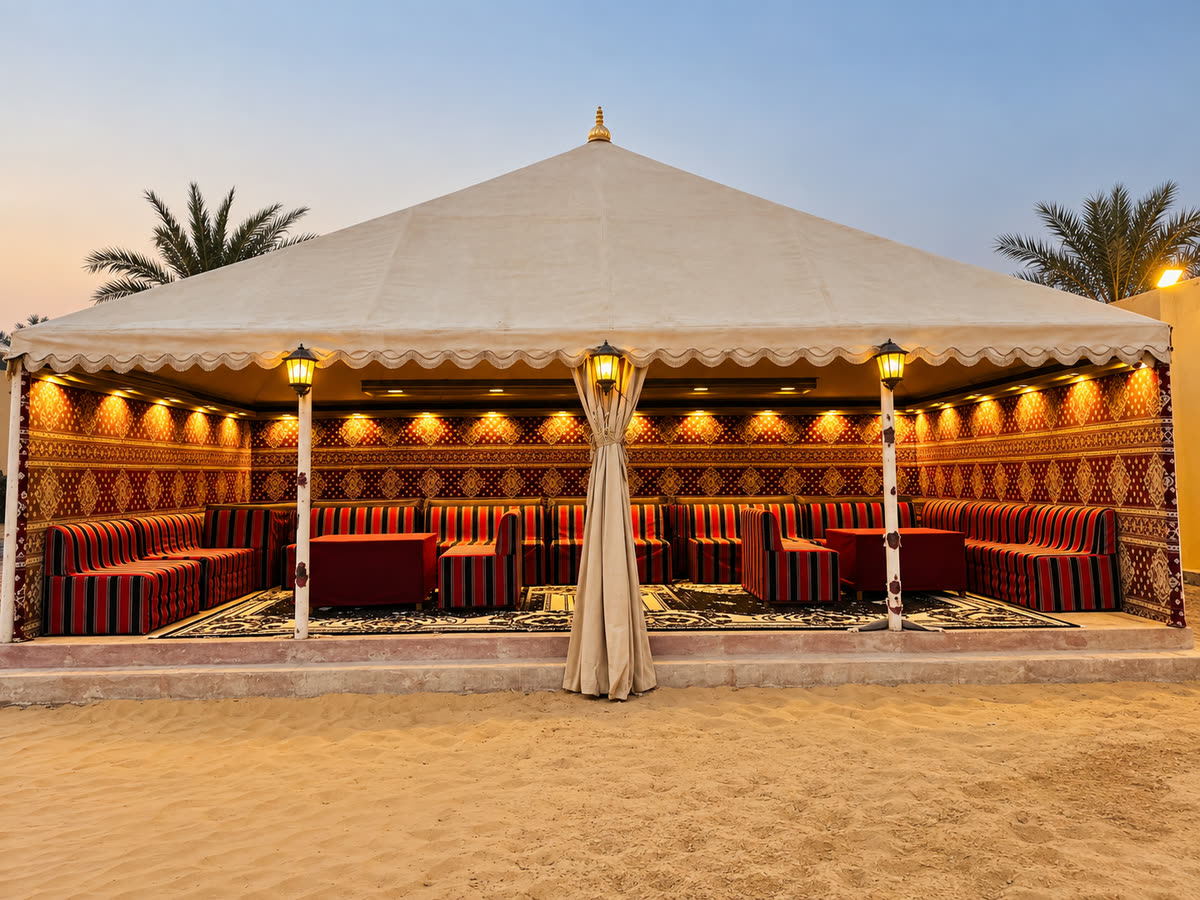 A served dinner setting at a desert camp